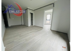 FAKÜLTE MEVKİNDE YATIRIMA UYGUN SATILIK 1+1 SIFIR